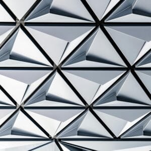 Futuristic silver geometric pattern on a modern building in Toronto.